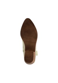 Suela de zapato de punta afilada, con un fondo de goma marrón texturizado y una mediasuela beige lisa. Acentuado con un material superior parecido al ante.