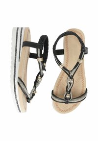 Sandali platform neri con design a striscia intrecciata e dettagli metallici. Suola in gomma piatta con dettagli bianchi e argentati. Soletta testurizzata.