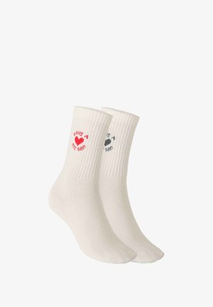 Chaussettes blanches à côtes avec texte imprimé en rouge et gris, "HAVE A NICE DAY", accompagné de symboles de cœur et de pique, en matière douce mélangée en coton.