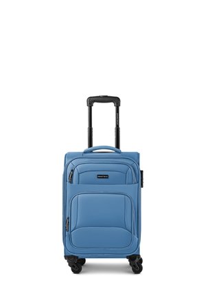 Blue soft fabric carry-on suitcase with four black spinner wheels and a black telescopic handle. Two front zippered pockets and top carry handle.