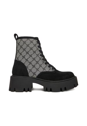 Sort snørestøvle med chunky riffel sål og mønstret gråt stof øverste med forbundne cirkulære design.