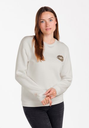 Hellbeige Sweatshirt mit Leopardenmuster auf der Brust, gerippten Bündchen und einer "Smile"-Stickerei auf dem Ärmel.