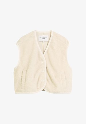 Beige fleecevest med kragefri design, frontlukk med knapper og to sidelommer. Myk tekstur med jevn, kontrasterende kant.