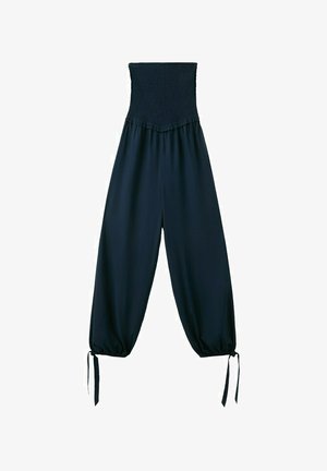 Sort, vidde buks med høj talje, elastisk smocket talje og bundet snøre ved ankelkant mod hvid baggrund.