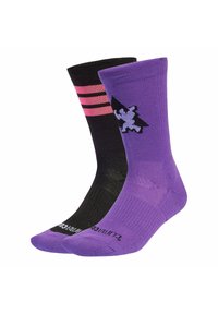 Lila och svarta strumpor; en har rosa ränder och en lejon-grafik. Materialet verkar slätt; måttlig höjd med ribbade manschetter.