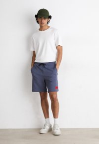 HUGO DIZ - Pantaloni de trening - open blue
