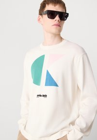 Calvin Klein Jeans Strikkegenser - tofu