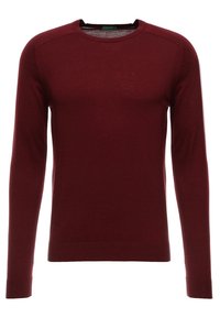 Vinröd tröja av mjukt stickat material, med rund halsringning, långa ärmar och ribbade muddar samt fåll för en figurnära passform.