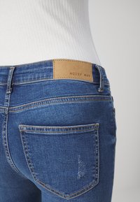 Noisy May NMLUCY CUT HEM - Jeans Skinny Fit - dark blue denim