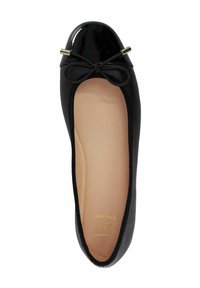 Black ballet flat with a glossy patent toe cap, a small bow accent, and gold hardware. Soft inner lining and rounded shape.