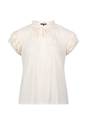 Light cream short-sleeve top with ruffle accents on shoulders, round neckline, and tie detail at the front. Made from soft, textured fabric.
