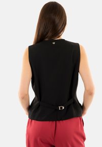 PLEASE Smanicato - noir