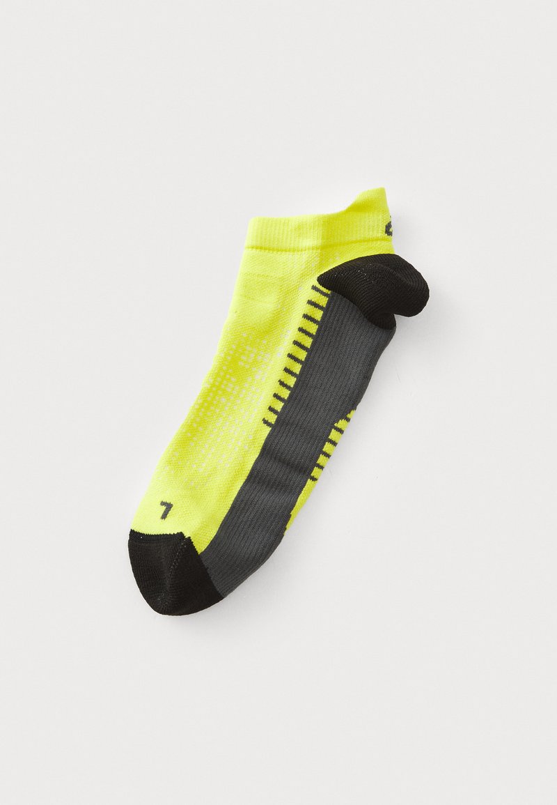 Neon gul, svart og grå lav athletic sokk med demping og venstre fot indikator på hvit bakgrunn.