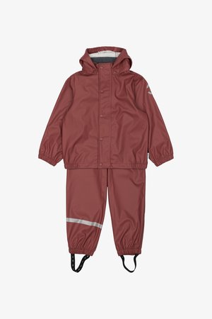 Alyvinis, vandeniui nepralaidus lietpaltis su kapišonu, elastingomis rankovėmis ir atspindinčiomis detalėmis. Komplekte yra striukė ir derančios kelnės su priglundančiais kulkšniais.