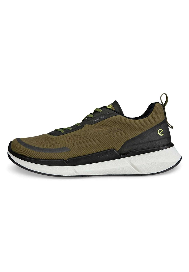 Olive green athletic shoe with a breathable upper, black accents, white sole, and green laces. Features a pull tab at the heel.