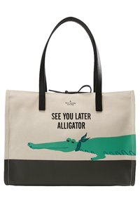 Borsa tote in tela con design diviso: parte superiore crema, parte inferiore grigio scuro, e grafica di un alligatore verde con il testo "SEE YOU LATER ALLIGATOR."
