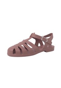 Roza gumijasti sandaļi z strappy dizajnom, odprtimi prsti in zadnjim trakom z nastavljivim sponko za varno prileganje. Ravna podloga brez okraskov.