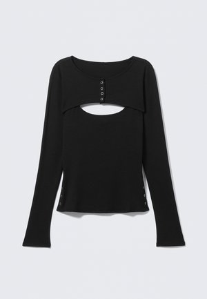 Μαύρο τοπ με μακριά μανίκια, με κομμένη λαιμόκοψη, πλαϊνή πατιλέτα με κουμπιά και λεπτομέρειες με πατητά κουμπώματα στα πλάγια. Κατασκευασμένο από λείο ύφασμα.