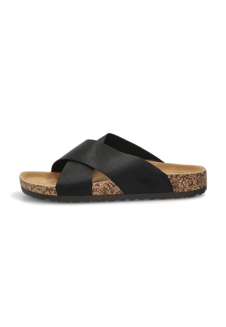 Sandalia deslizante de cuero negro con diseño de tiras entrelazadas, suela de corcho y acabado texturizado. Plantilla plana para mayor comodidad.