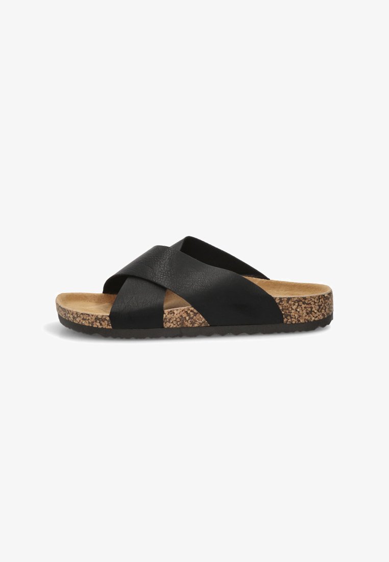 Sandalia deslizante de cuero negro con diseño de tiras entrelazadas, suela de corcho y acabado texturizado. Plantilla plana para mayor comodidad.