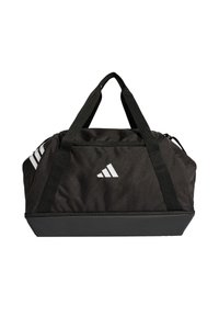 Bolsa de viaje negra de tela duradera, con detalles en rayas blancas, base reforzada y dos asas para facilitar el transporte.