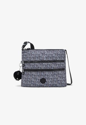 Schwarz-weiße gemusterte Umhängetasche mit zwei Reißverschlussfächern, aus Stoffmaterial, verstellbarem Tragegurt und einem Pompon-Detail.