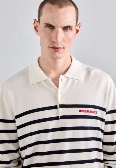 Valge polo särk mustade horisontaalsete triipudega, sisaldab punast "DSQUARED2" logo, nööpidega krae ja pehme kangatunne.