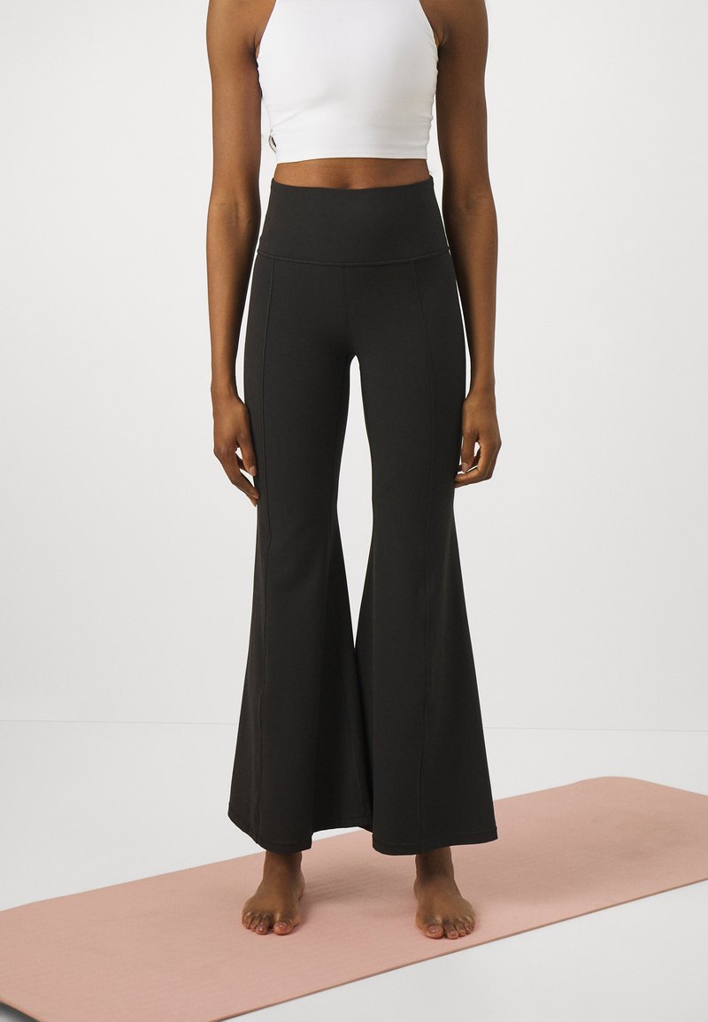 Athleta ULTRA FLARE PANT Legging black/zwart Zalando.nl