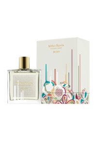 Clear glass perfume bottle with a gold cap beside a decorated box featuring colorful floral designs and the text "Miller Harris Melody."