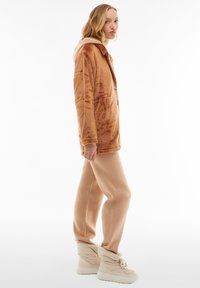 Freddy Abrigo corto - thrush