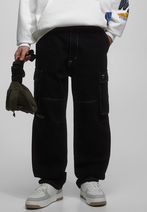 WITH SEAMS - Reisitaskuhousut - mottled black