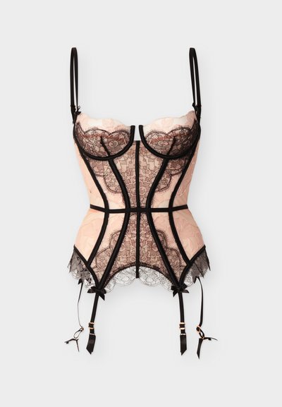 Μπεζ κορσές με μαύρη δαντέλα, μπανέλες στα cups, ρυθμιζόμενους ιμάντες ώμων και τέσσερις μαύρους ιμάντες για ζαρτιέρες με χρυσούς μεταλλικούς κρίκους.