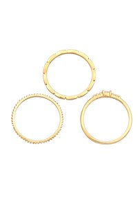 Drei goldene Ringe: einer mit glatter Oberfläche, einer mit gezacktem Rand und einer mit kleinen klaren Steinen. Verschiedene Texturen und Designs.