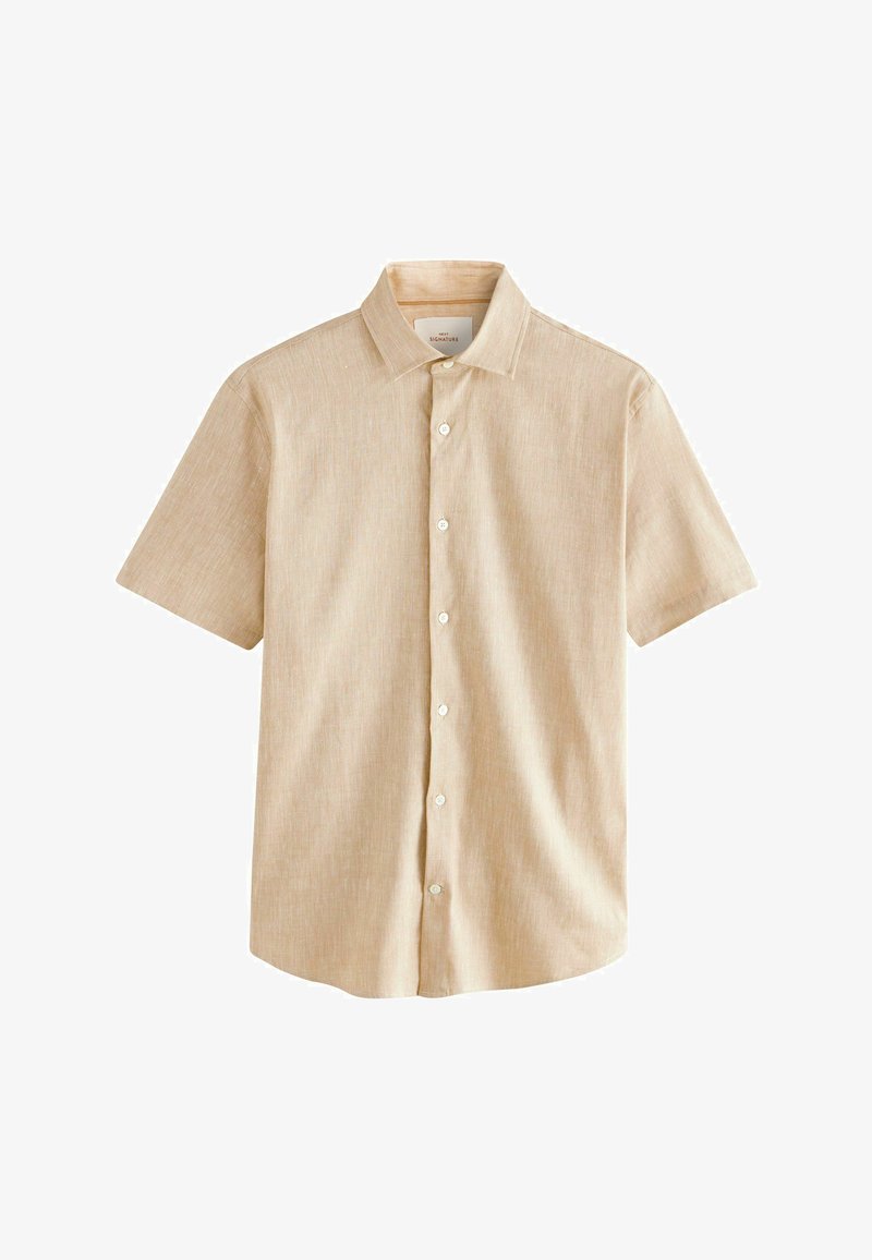 Camicetta a maniche corte di un beige chiaro, realizzata in tessuto tessuto, con colletto e chiusura frontale con bottoni bianchi.