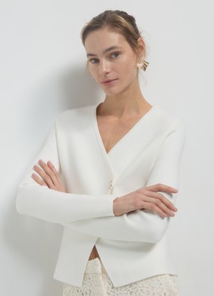 Calliope Strickjacke - bianco lana
