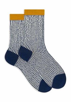 Striped socks in navy blue and white, with a yellow ribbed cuff. Features a textured pattern and solid navy heel and toe sections.