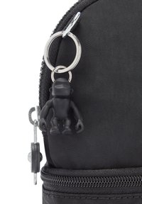 Black fabric zippered pouch featuring a metal zipper pull and a black figurine keychain attached. Textured surface with a prominent zipper closure.