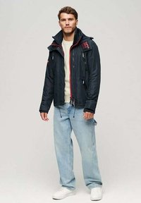 Superdry Jassen voor Heren: 85 Producten