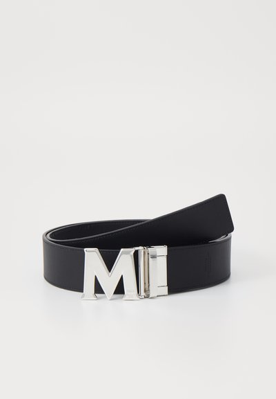 Black leather belt featuring a shiny silver buckle with "MI" design. The belt is smooth-textured with a classic, minimalist shape.