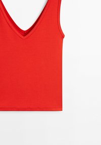 Red sleeveless tank top with deep V-neck and clean, simple stitching on a white background.