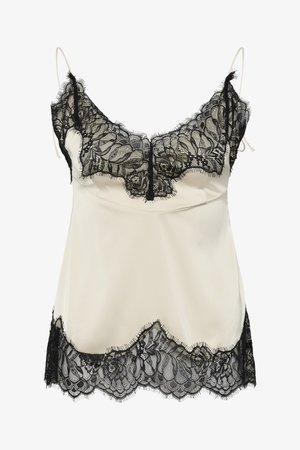 Kremowa jedwabna koszulka na ramiączkach z czarną koronkową ozdobą w kwiaty na dekolcie i u dołu, z cienkimi regulowanymi ramiączkami.