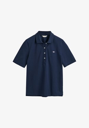 Tumesinine polo-särk, mis on valmistatud puuvillast, klassikalise kraega, kolme nupuga kinnituse ja rinnal väikese värvitud logoga.