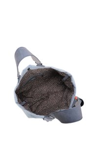 Tote bag in similpelle blu con un'ampia apertura, caratterizzata da un interno marrone con motivi a pois rosa e una tasca con zip.