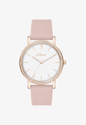 Roségoldene Uhr mit weißem Zifferblatt, pinkem Silikonarmband und Kristallverzierungen auf der Lünette. Einfache Stundenmarkierungen und Logo bei der 12-Uhr-Position.