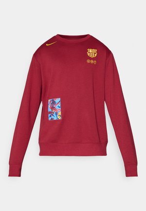 Sweatshirt vermelho feito de tecido macio. Apresenta um decote redondo, mangas compridas, um logo da Nike amarelo e um emblema gráfico colorido na frente.