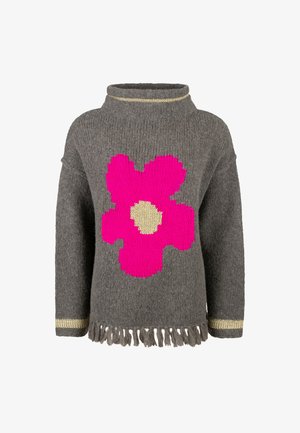 Gray knit sweater with large pink flower and cream center on front, gold accents on collar and cuffs, and fringe at hem.