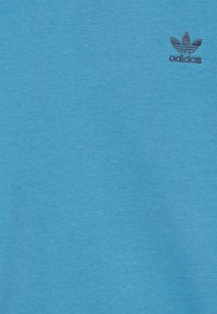 adidas Originals CREW SET - Calças de fato de treino - light blue