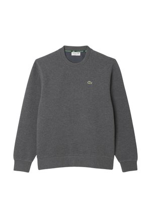 Sudadera de cuello redondo en gris oscuro con mangas largas, puños y dobladillo acanalados, y un pequeño logo del cocodrilo verde de Lacoste en el pecho.