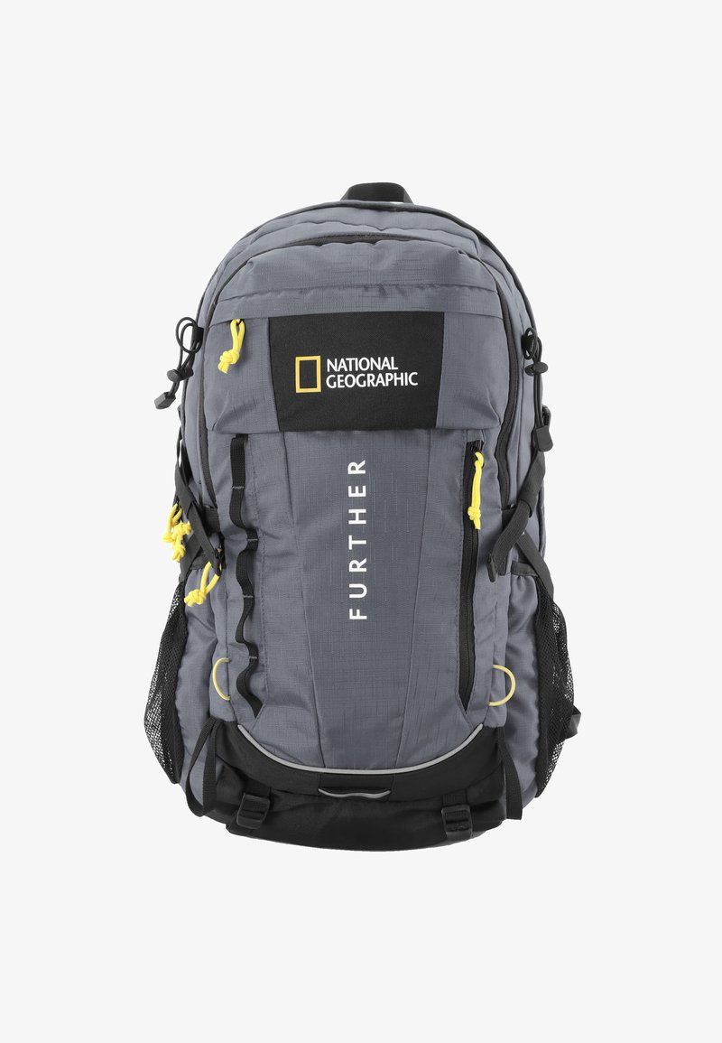 Gray fabric backpack features a black top panel with the National Geographic logo, yellow accents, multiple pockets, and mesh side panels.