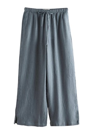 Wide-leg pants in soft, textured fabric. Light blue-gray color with an elastic waistband and adjustable drawstring. Side slits at the hem.